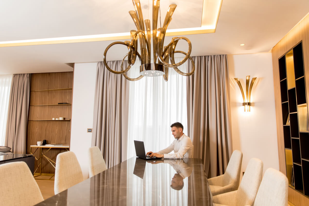 young-man-sitting-in-a-luxurious-room-in-front-of-UYPWAP7.jpg